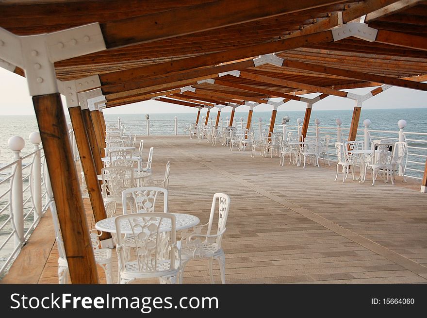 A Day walk, alone on the empty touristic Wooden deck on Caspian Sea. A Day walk, alone on the empty touristic Wooden deck on Caspian Sea