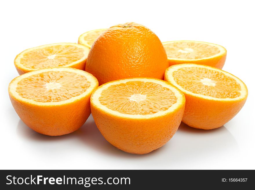 Orange halves on white background