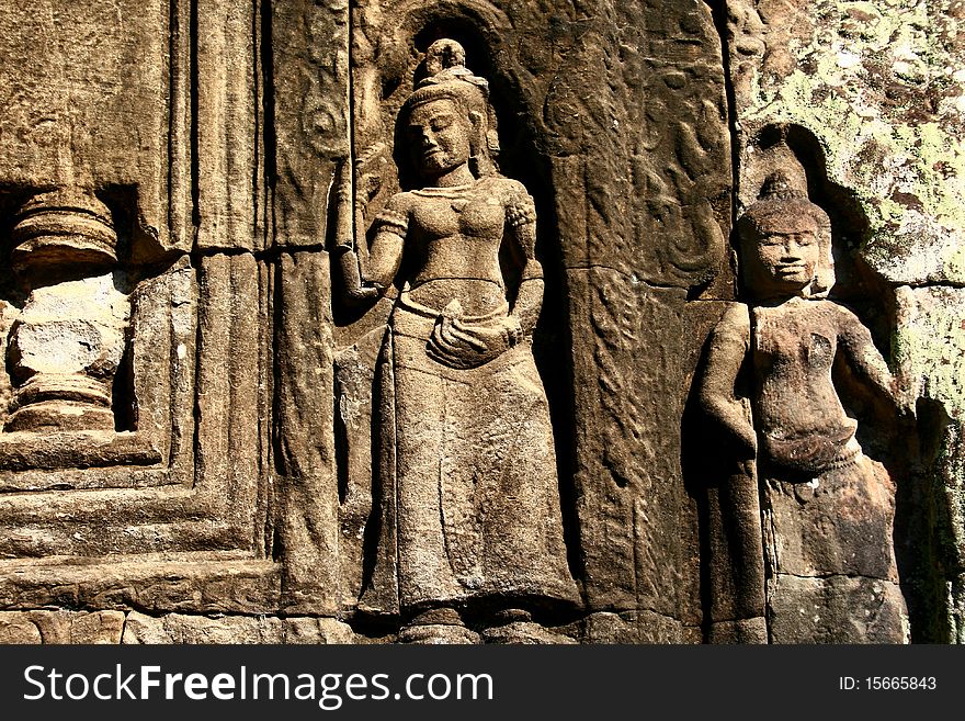 Carved in the walls at Angkor Wat Siem Reap Cambodia. Carved in the walls at Angkor Wat Siem Reap Cambodia.