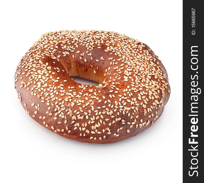 Bagel, isolated on white, with sesame seeds. Bagel, isolated on white, with sesame seeds.