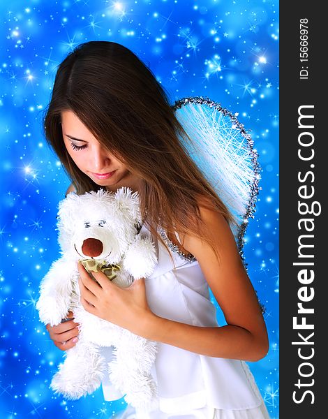 Girl dressed as an angel against the starry sky. Girl dressed as an angel against the starry sky