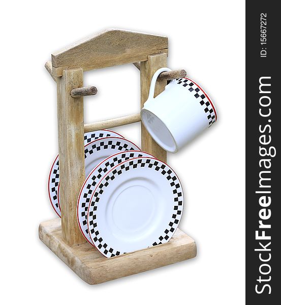 Coffee cups on wooden rack isolated
