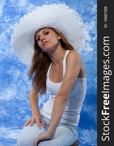 Female model posing with hat on. Female model posing with hat on