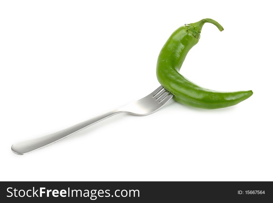Fork with green hot pepper