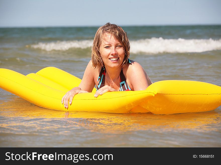 Pregnant woman enjoying in water. Pregnant woman enjoying in water