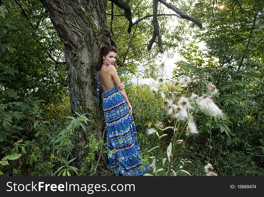 Young Woman Near Tree