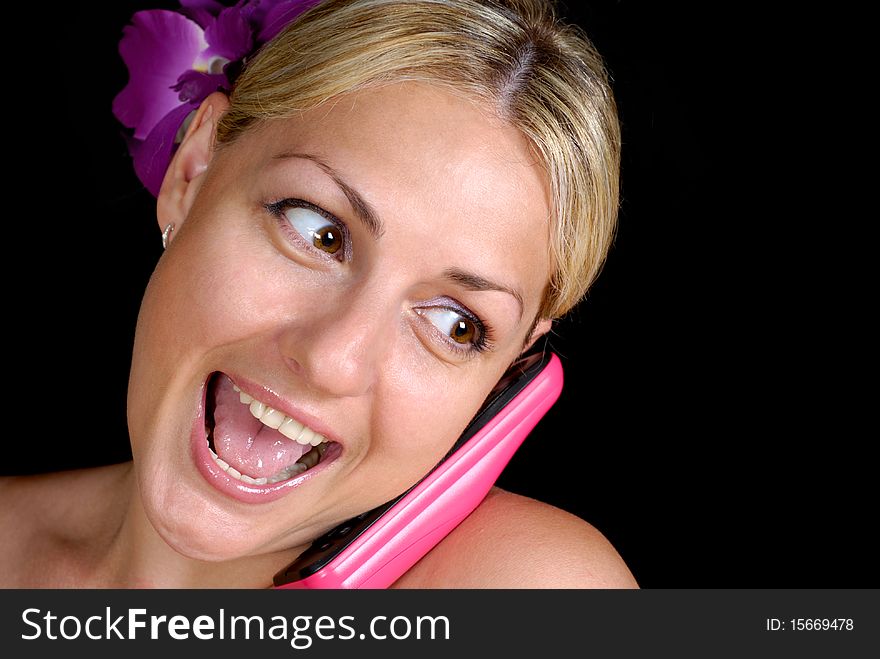Blonde girl on a black background on the phone. Blonde girl on a black background on the phone