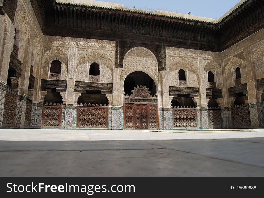 A view of the inside of the courtyard of a Koranic school in Fes. A view of the inside of the courtyard of a Koranic school in Fes