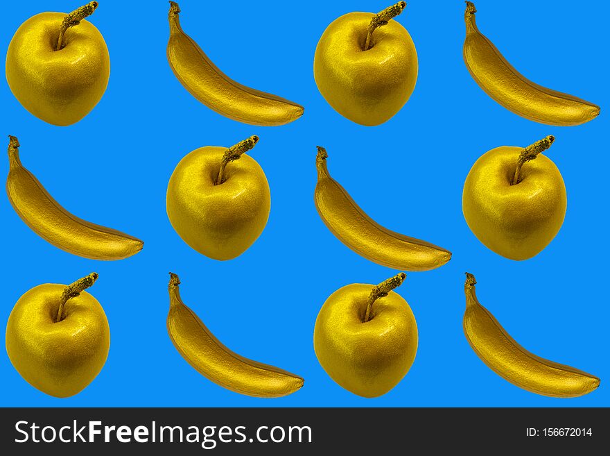 Collage Of Golden Apples And Bananas On The Blue Background. Isolate