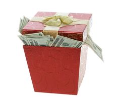 Twenty Dollar Bills Coming Out Of A Red Gift Box Royalty Free Stock Photo