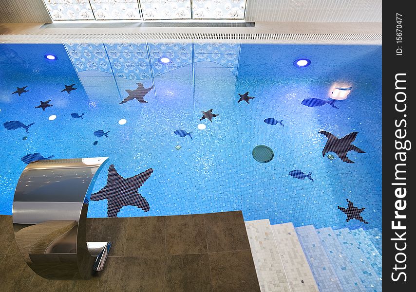 Interior of a swimming pool with blue mosaic. Interior of a swimming pool with blue mosaic