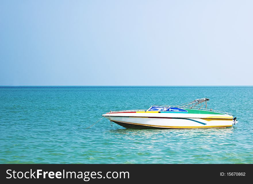 Colored vintage motorboat in a sunny day