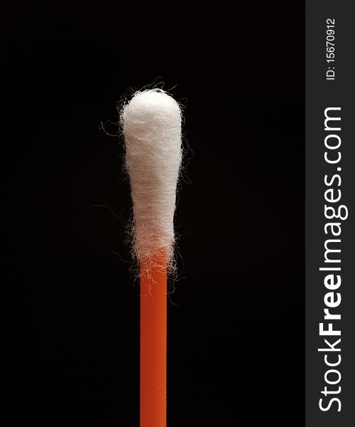 Cotton wool buds on black. Cotton wool buds on black