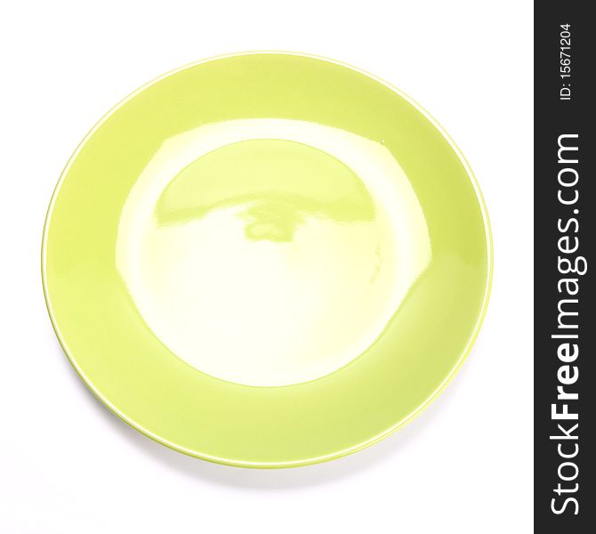 Empty green plate on white background. Empty green plate on white background