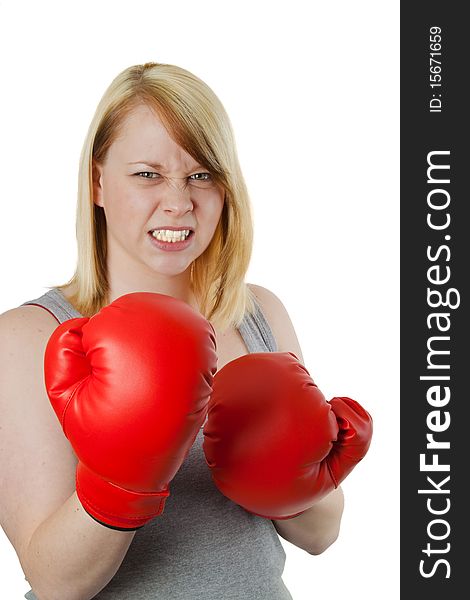 Young woman with red boxing gloves - isolated on white. Young woman with red boxing gloves - isolated on white
