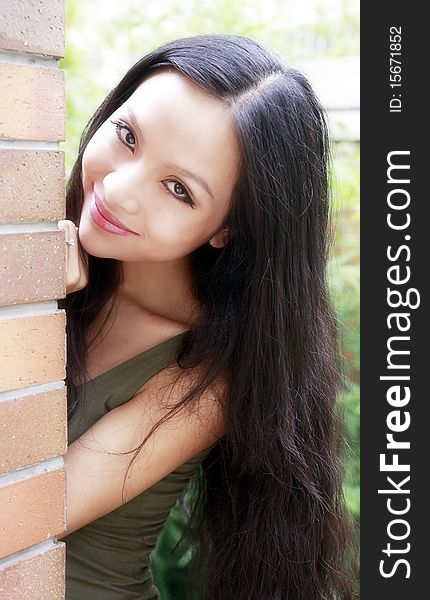 Beautiful Chinese girl smiling in summer. Beautiful Chinese girl smiling in summer.