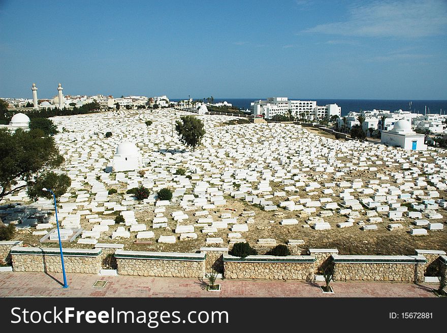 Cementary in Monastir, Tunisia, blue sky and white graves