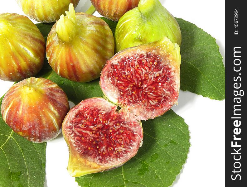 Ripe juicy figs isolated on white background