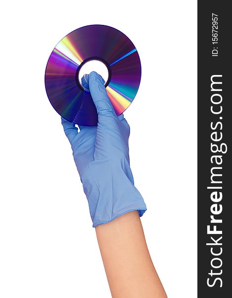 Disk with dangerous confidential audio and video about hacker programs and viruses in a hand of the inspector. Disk with dangerous confidential audio and video about hacker programs and viruses in a hand of the inspector