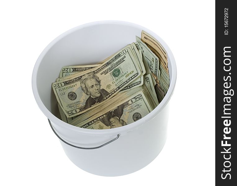 US Currency Twenty Dollar Bills in a white cleaning Bucket, isolated on white background. US Currency Twenty Dollar Bills in a white cleaning Bucket, isolated on white background.