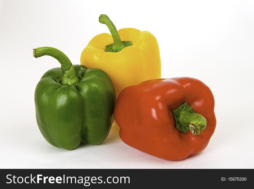 Healthy and ripe red, green and yellow peppers. Healthy and ripe red, green and yellow peppers