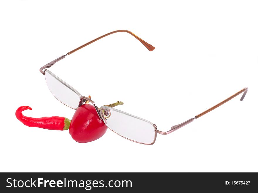 Two different red chili peppers with reading glases isolated on white. Two different red chili peppers with reading glases isolated on white