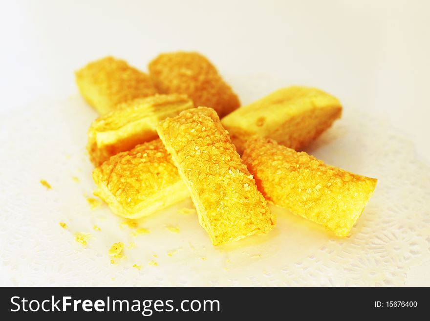 Sugar with crispy bread in white background. Sugar with crispy bread in white background