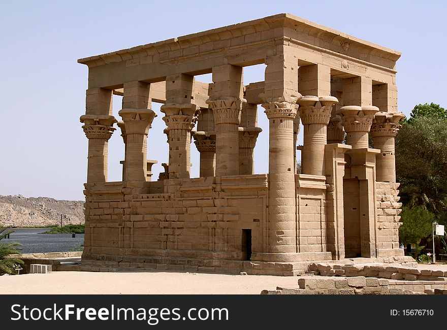 The original sacred island of Philae is now beneath Lake Nasser. Between 1972 and 1980 the temples on this island were dismantled and rebuilt on a higher nearby island, which has been renamed Philae. This temple complex was an important cult center in Greco-Roman times and a popular tourist spot for 18th and 19th century travelers. However, these visitors saw brightly painted capitals--before the temple complex was submerged in the waters of the Aswan Dam. The complex was dismantled and relocated to a nearby island in connection to the UNESCO project started because of the construction of the High Dam, after being partly flooded by the first Aswan Dam for half a century. The original sacred island of Philae is now beneath Lake Nasser. Between 1972 and 1980 the temples on this island were dismantled and rebuilt on a higher nearby island, which has been renamed Philae. This temple complex was an important cult center in Greco-Roman times and a popular tourist spot for 18th and 19th century travelers. However, these visitors saw brightly painted capitals--before the temple complex was submerged in the waters of the Aswan Dam. The complex was dismantled and relocated to a nearby island in connection to the UNESCO project started because of the construction of the High Dam, after being partly flooded by the first Aswan Dam for half a century.