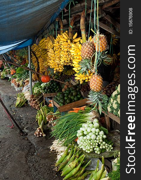 Various fresh vegetables and fruit at asian traditional market. Various fresh vegetables and fruit at asian traditional market
