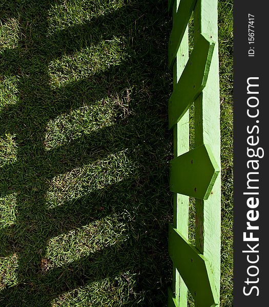 Shadow of wood fence in farm