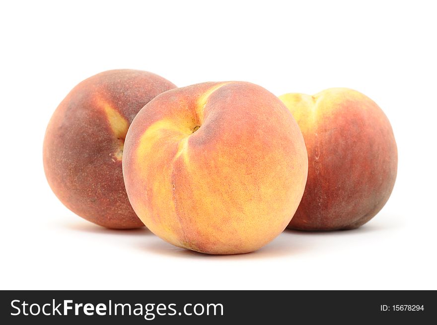 Juicy peaches isolated on a white background