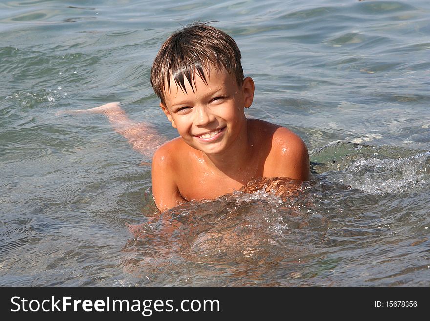 Happy Boy In The Sea