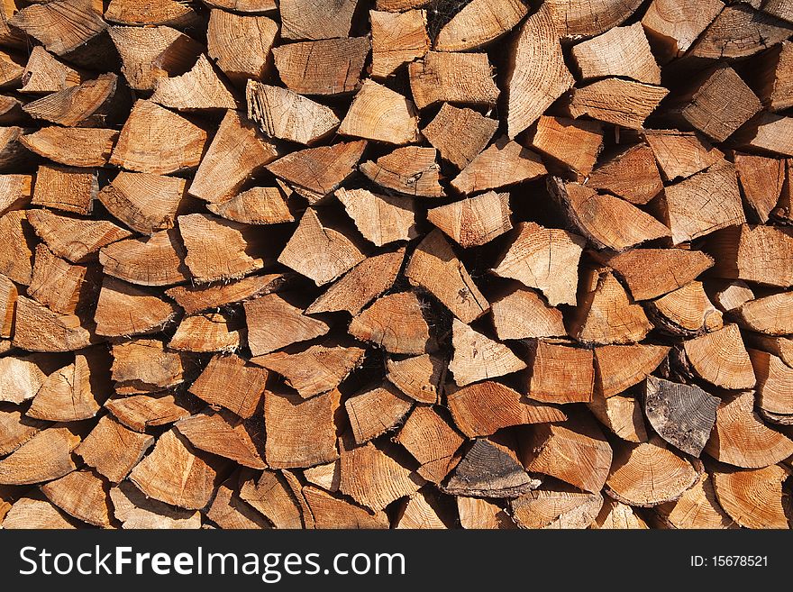 The firewood stack background texture. The firewood stack background texture