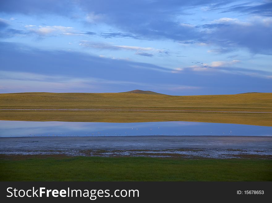 The colorful lake in the summer morning of prairies, Inner Mongolia, China. The colorful lake in the summer morning of prairies, Inner Mongolia, China