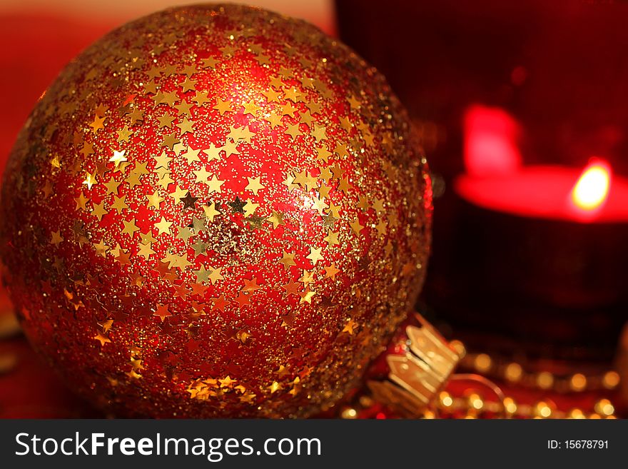 Macro of red star ornamented glass ball - Christmas time. Macro of red star ornamented glass ball - Christmas time