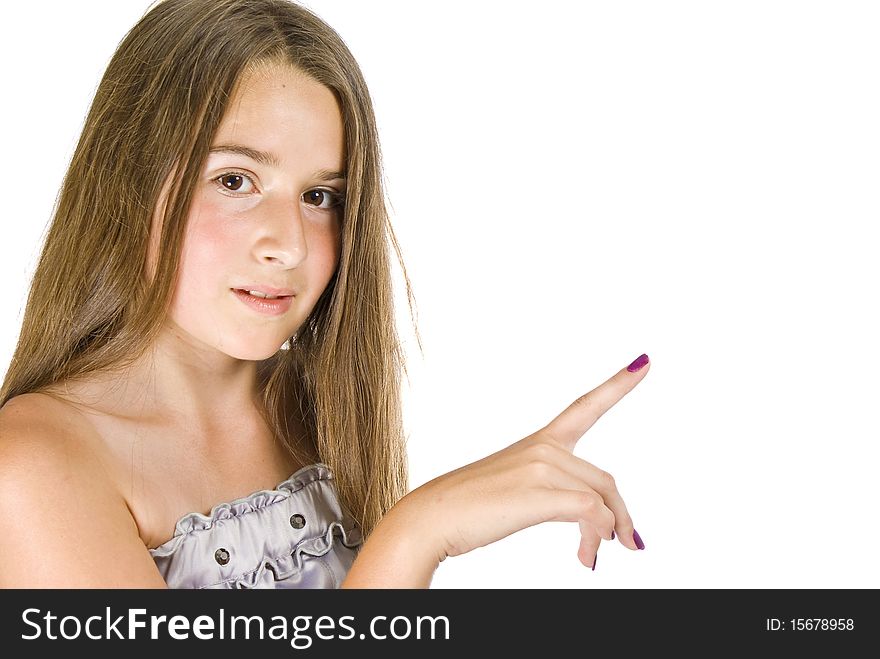 An attractive young girl pointing at something