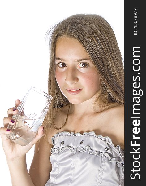 Young gril drinking water on white. Young gril drinking water on white