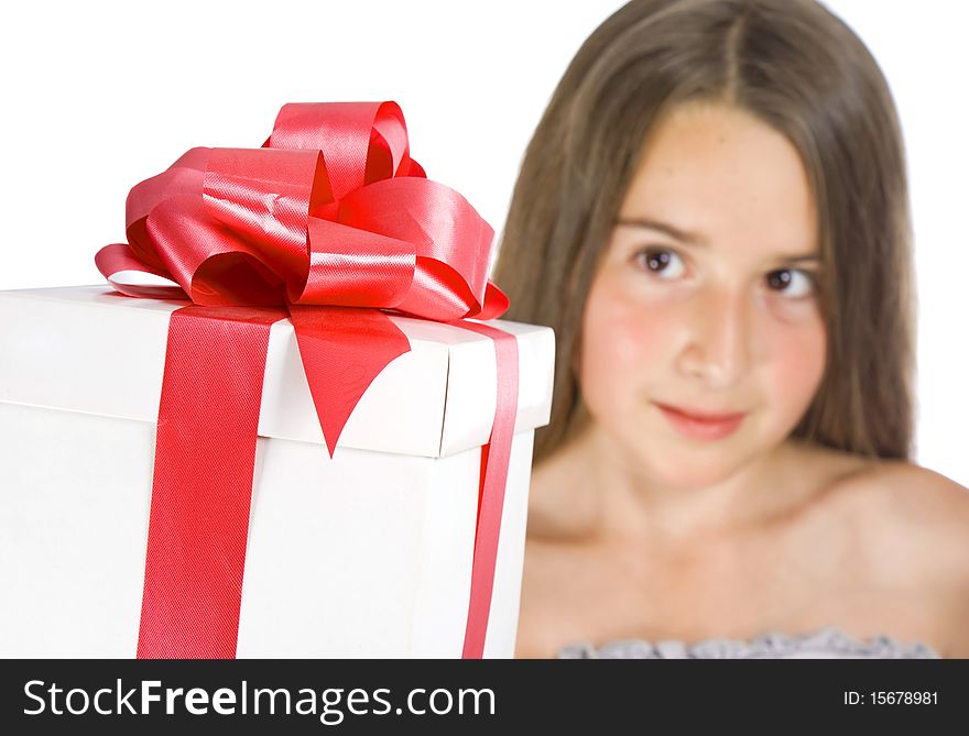 Happy girl with gift box over white