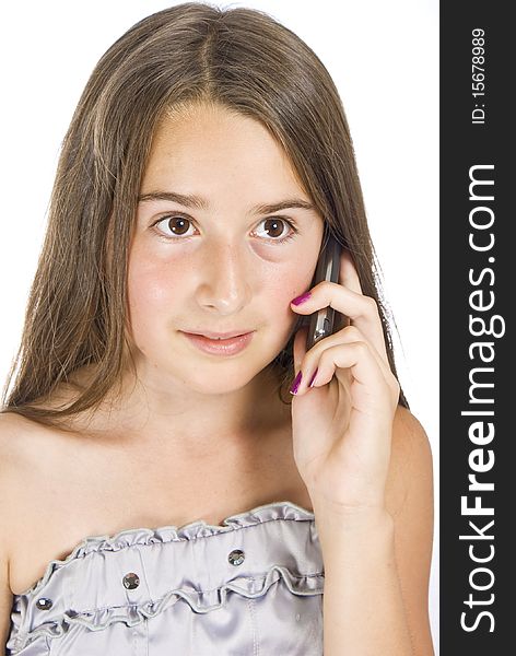 Portrait of a happy young woman enjoying conversation on mobile phone. Portrait of a happy young woman enjoying conversation on mobile phone
