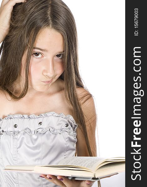 Portrait of young beautiful girl with book