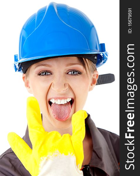 Portrait of young female construction worker with blue hardhat and yellow glove, showing rock on sign. Portrait of young female construction worker with blue hardhat and yellow glove, showing rock on sign