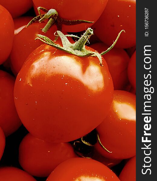 Tomatoes, which are fruits or vegetables, contain a lot of vitamins