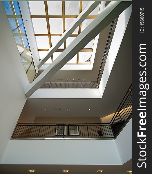 Office building interior lobby with skylight and balconies. Office building interior lobby with skylight and balconies