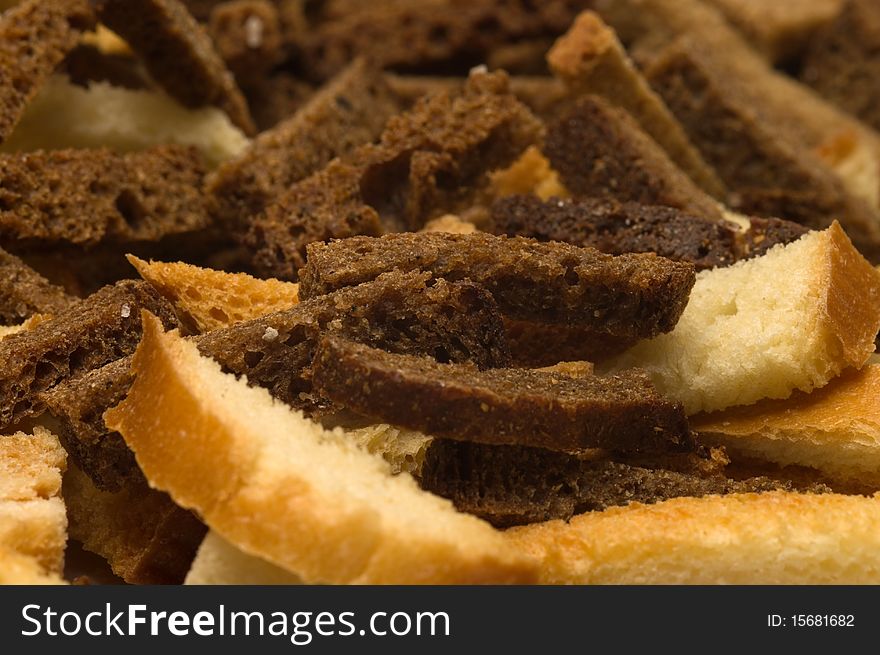 Background of rye and wheat crackers salty closeup. Background of rye and wheat crackers salty closeup.