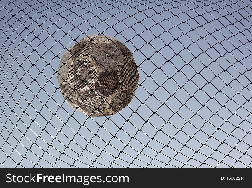 Soccer ball in the goal