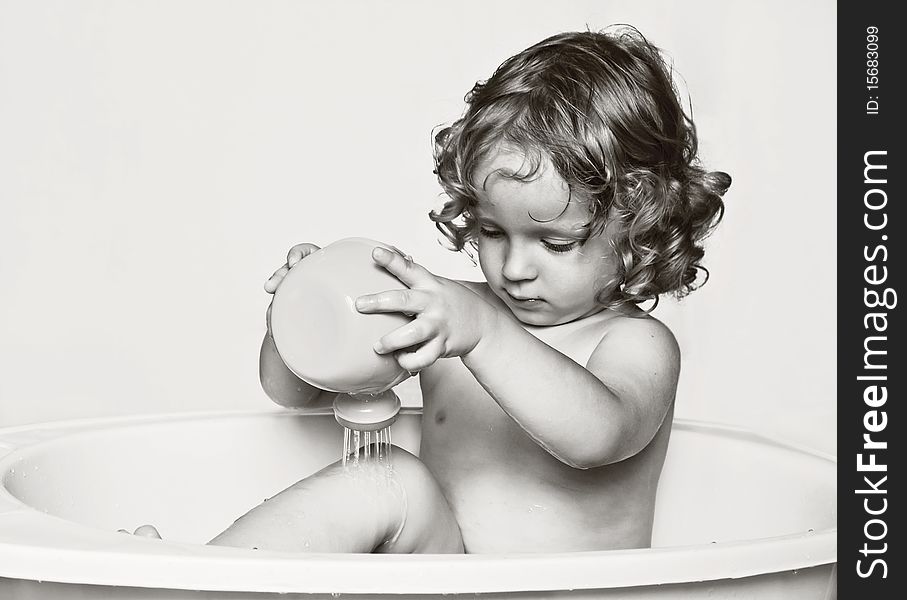 The little boy bathes in bathing. The little boy bathes in bathing.