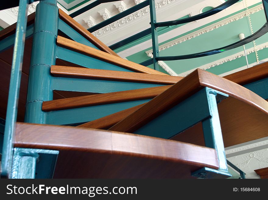 Metal and wood spiral staircase. Metal and wood spiral staircase.