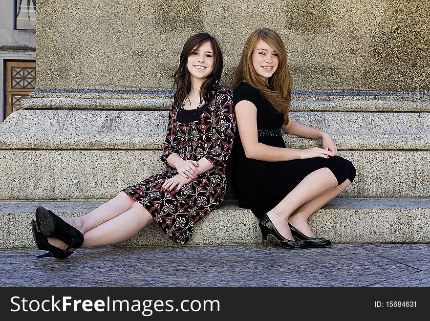 Two young girls on structure downtown. Two young girls on structure downtown