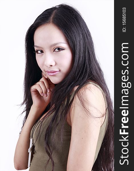 Pretty Asian woman with long hair on white.