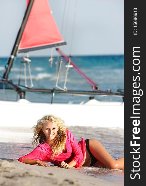 Young beautiful girl on sea yacht background